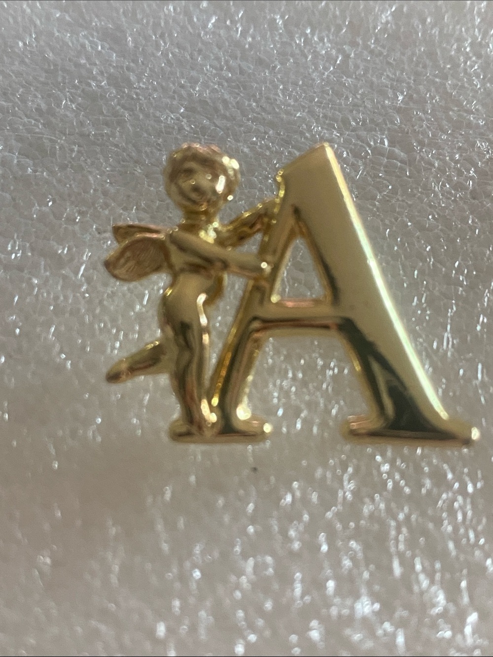 L Razza Cherub Holding Initial A Brooch